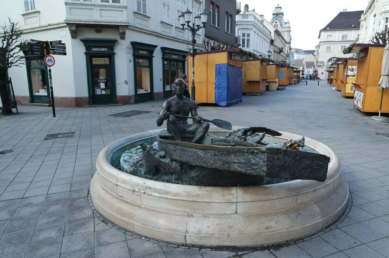 A sculpture of a man in a boat in Gyor