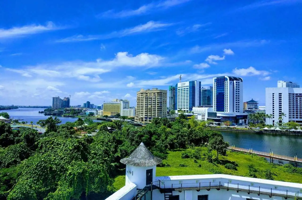 Buildings in front of a lake in Kuching - cheap places to visit in Malaysia