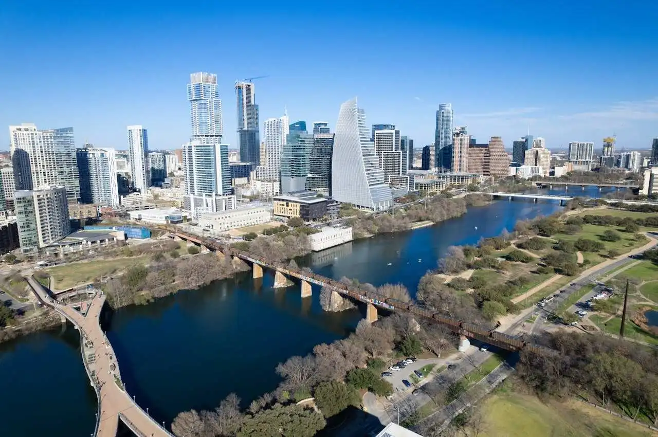 A lake in front of a neighborhood in Austin
