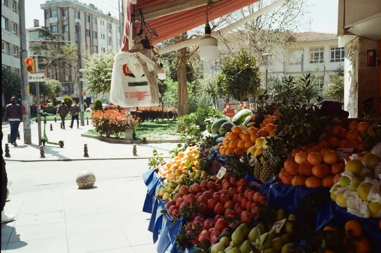 Fruits with people roaming around