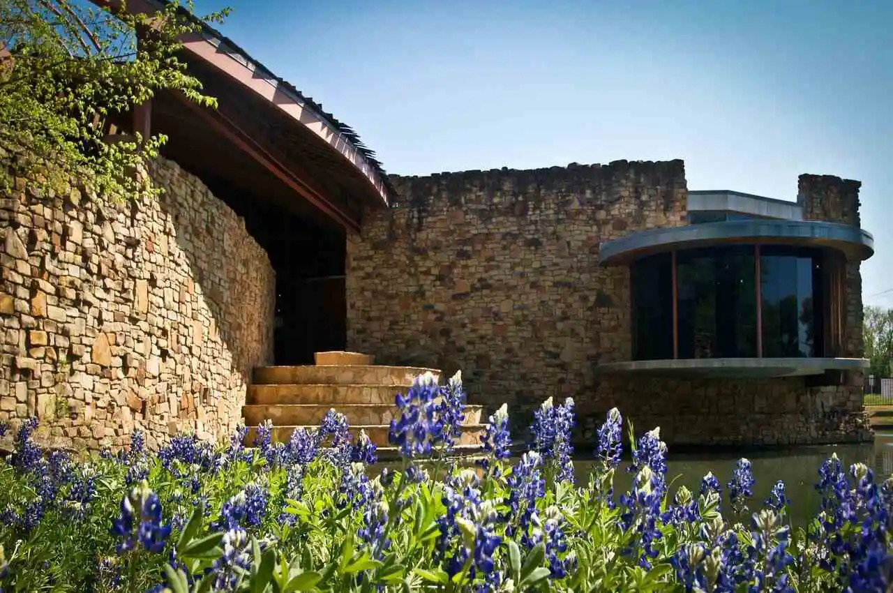 Hill Nature Center with flowers in front