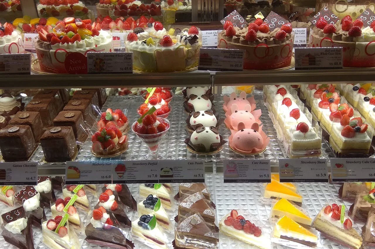 Different cakes and pastries on display.