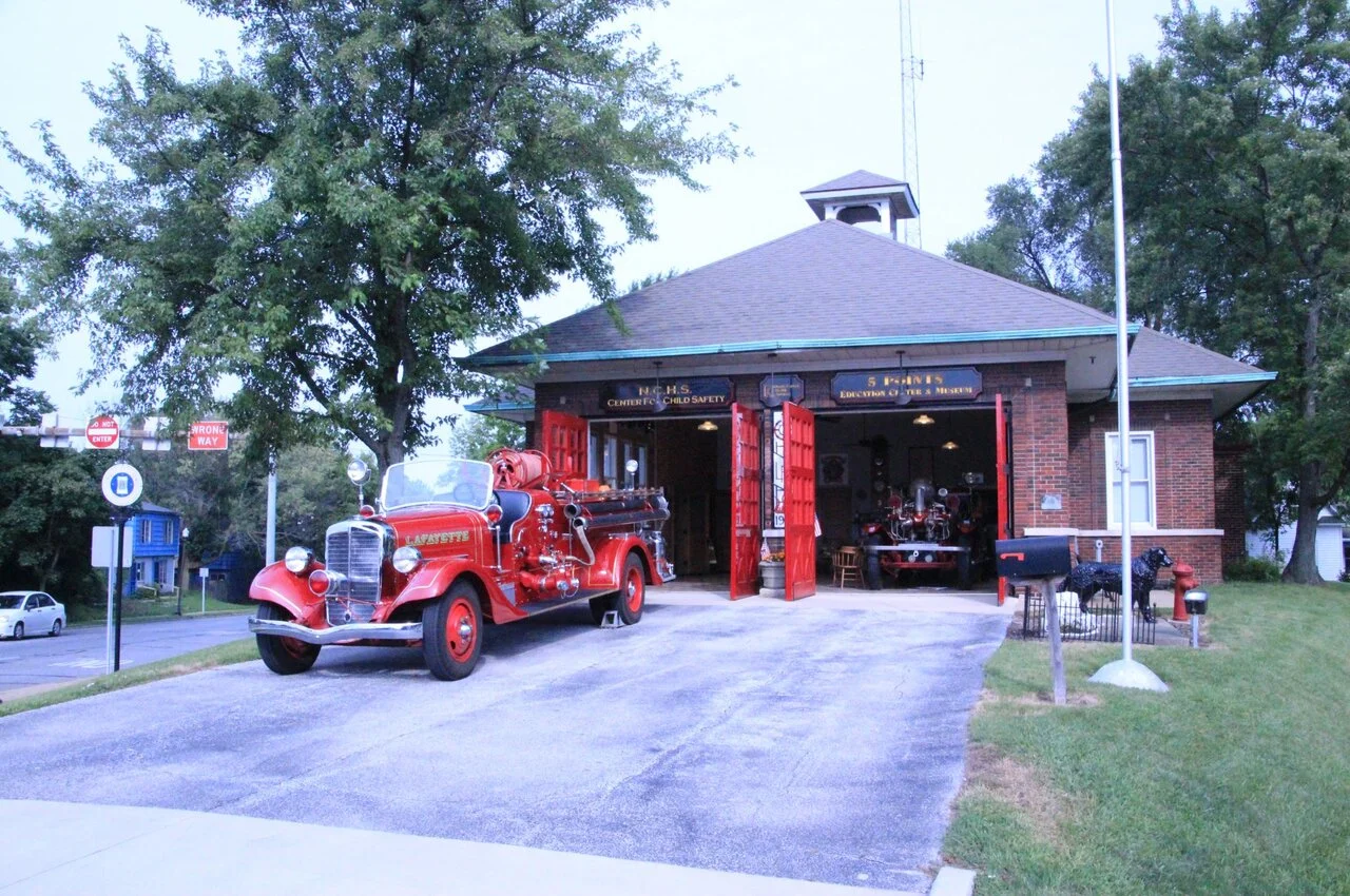 An old firefighter truck in the Five Point Fire Museum
