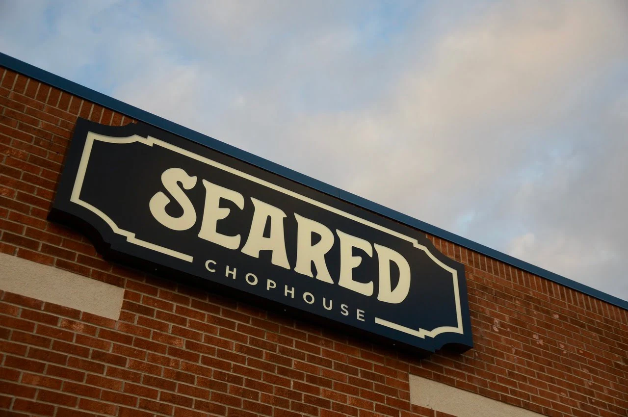 Seared Chophouse banner on the restaurant.