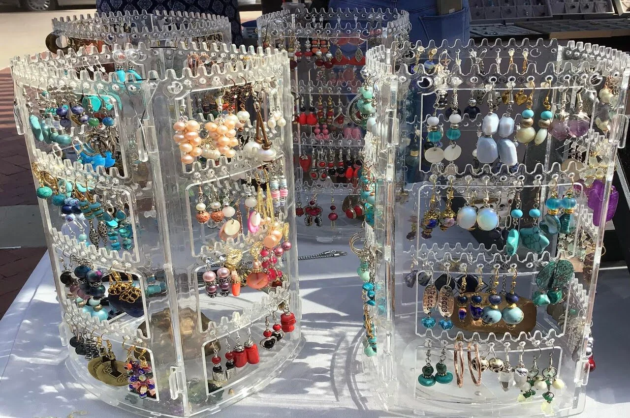 Bracelets and keychains on display in a local market.