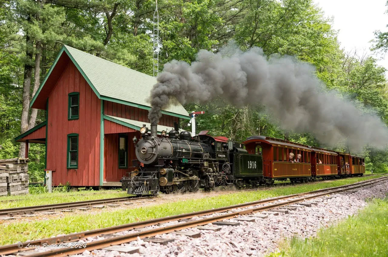 A steam train with a serene background. Among hidden gems in Wisconsin Dells