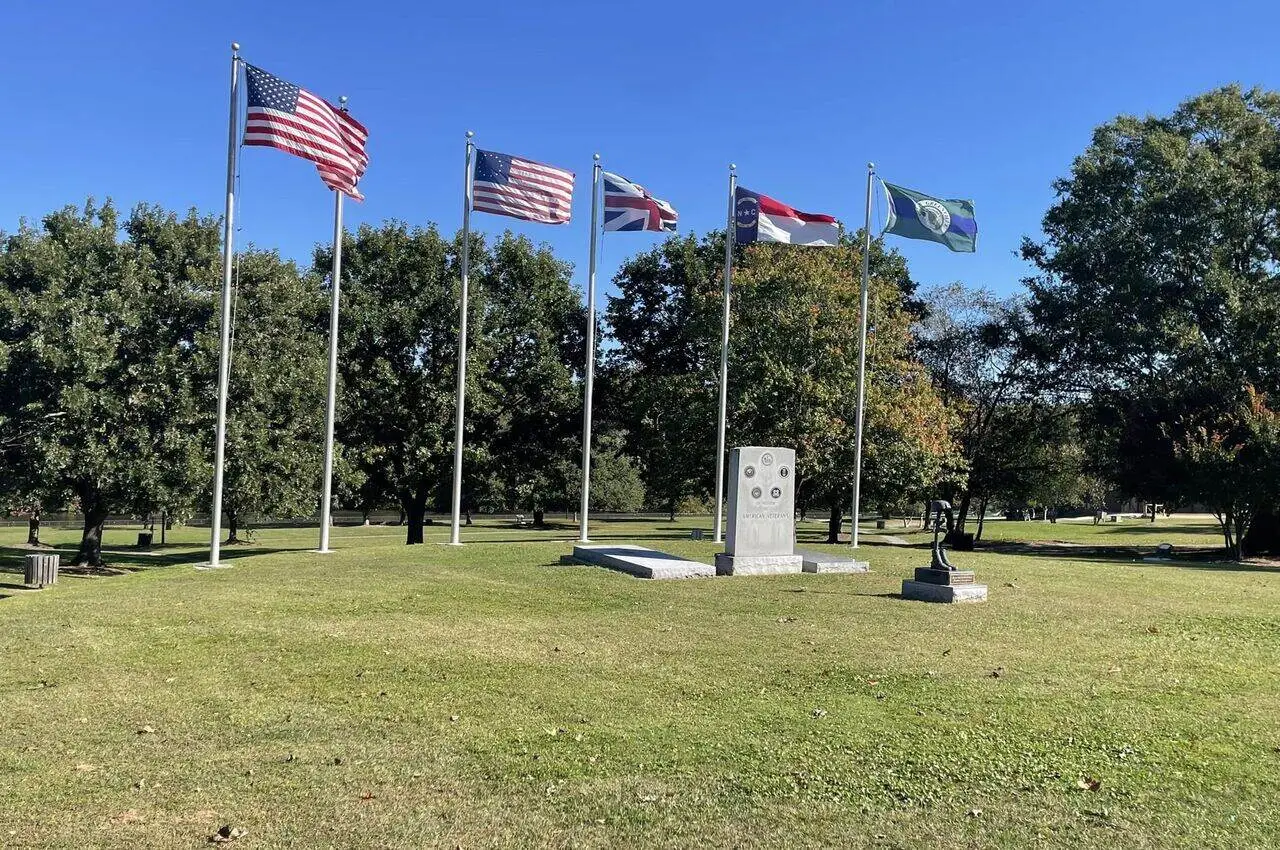 Different flags in a park.