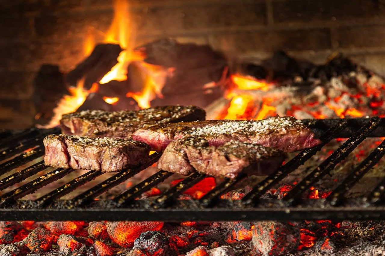 A steak on a grill.