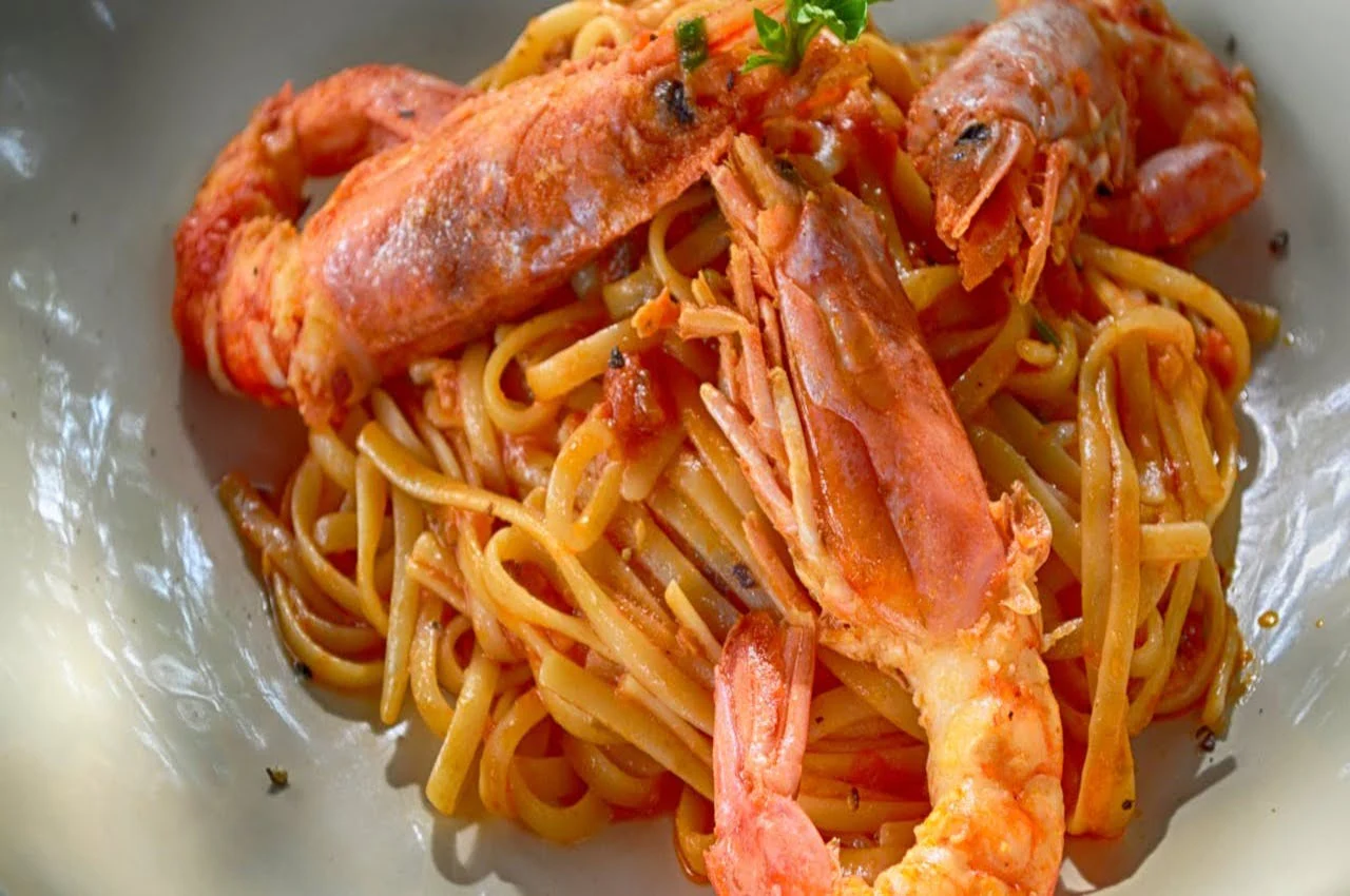 Shrimp on pasta.
