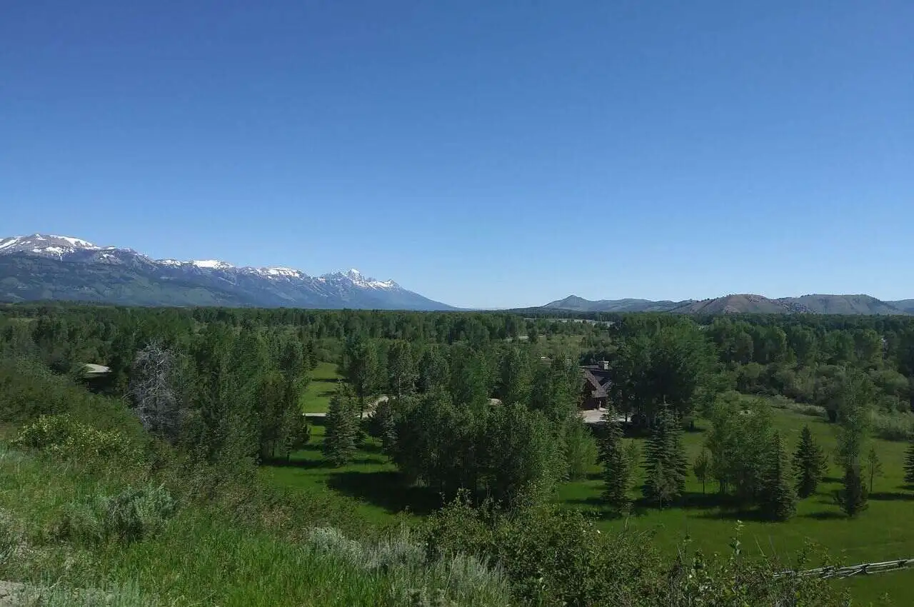 Natural greenery with mountains on the back.. Among hidden gems in Jackson and Jackson Hole