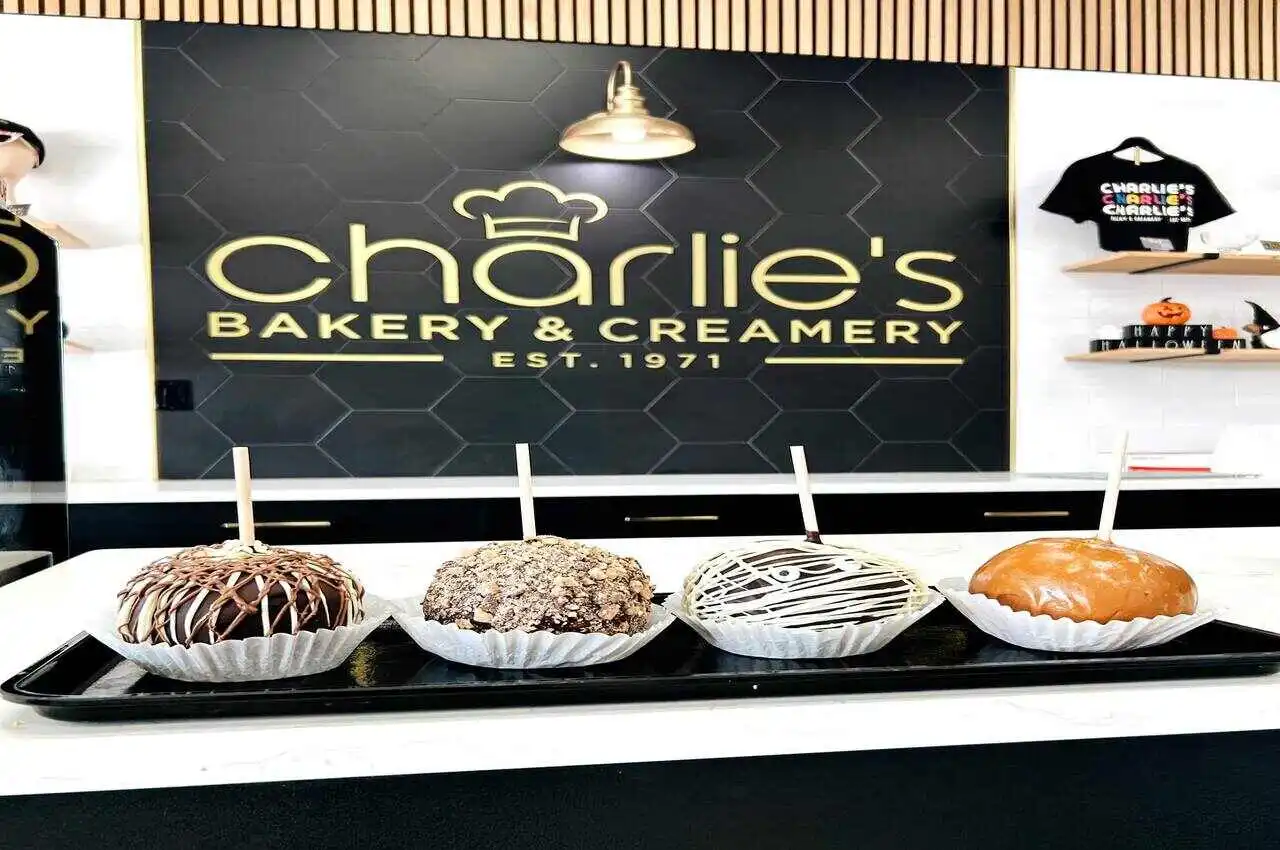 different cake flavors with Charlies banner on the back