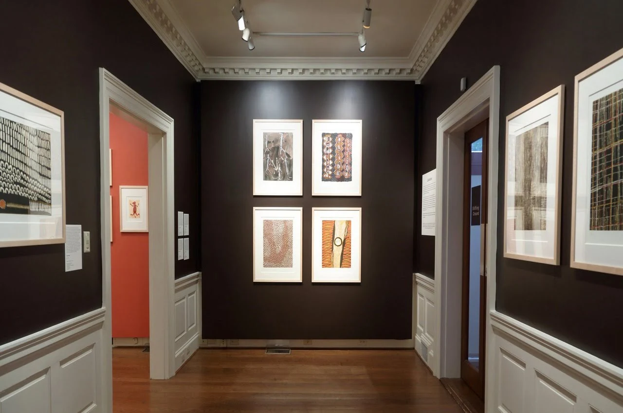 pictures and paintings hanging on the wall