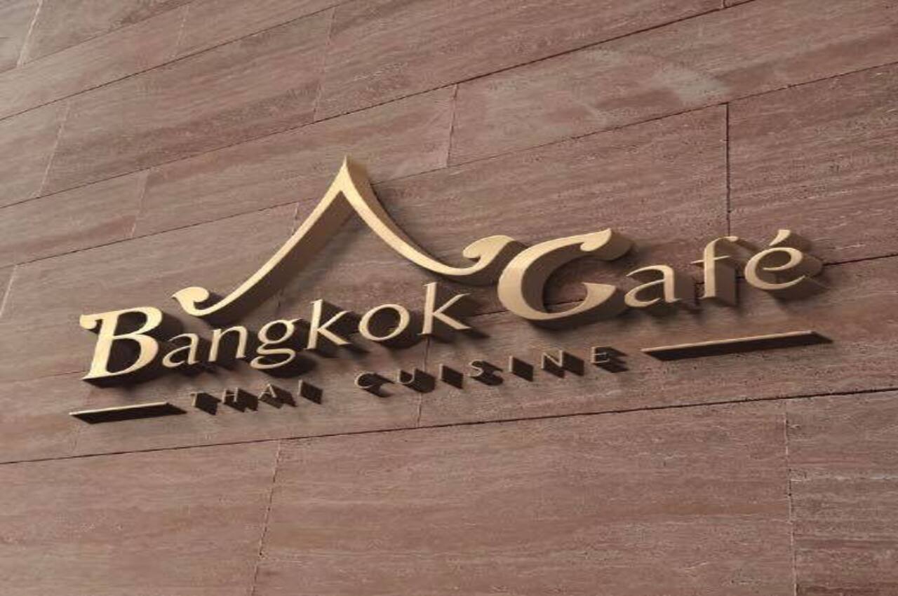Bangkok Cafe written on top of a building